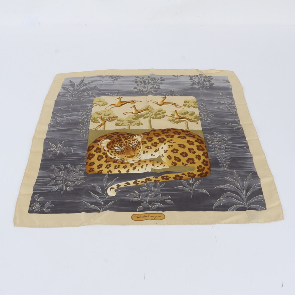 Salvatore Ferragamo tagged 100% silk leopard print scarf for women and men.